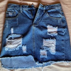 Distressed denim miniskirt size 6